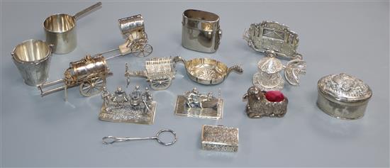 Fourteen assorted white metal and other small collectables including Dutch pipe organ, band group and Scandinavian boat